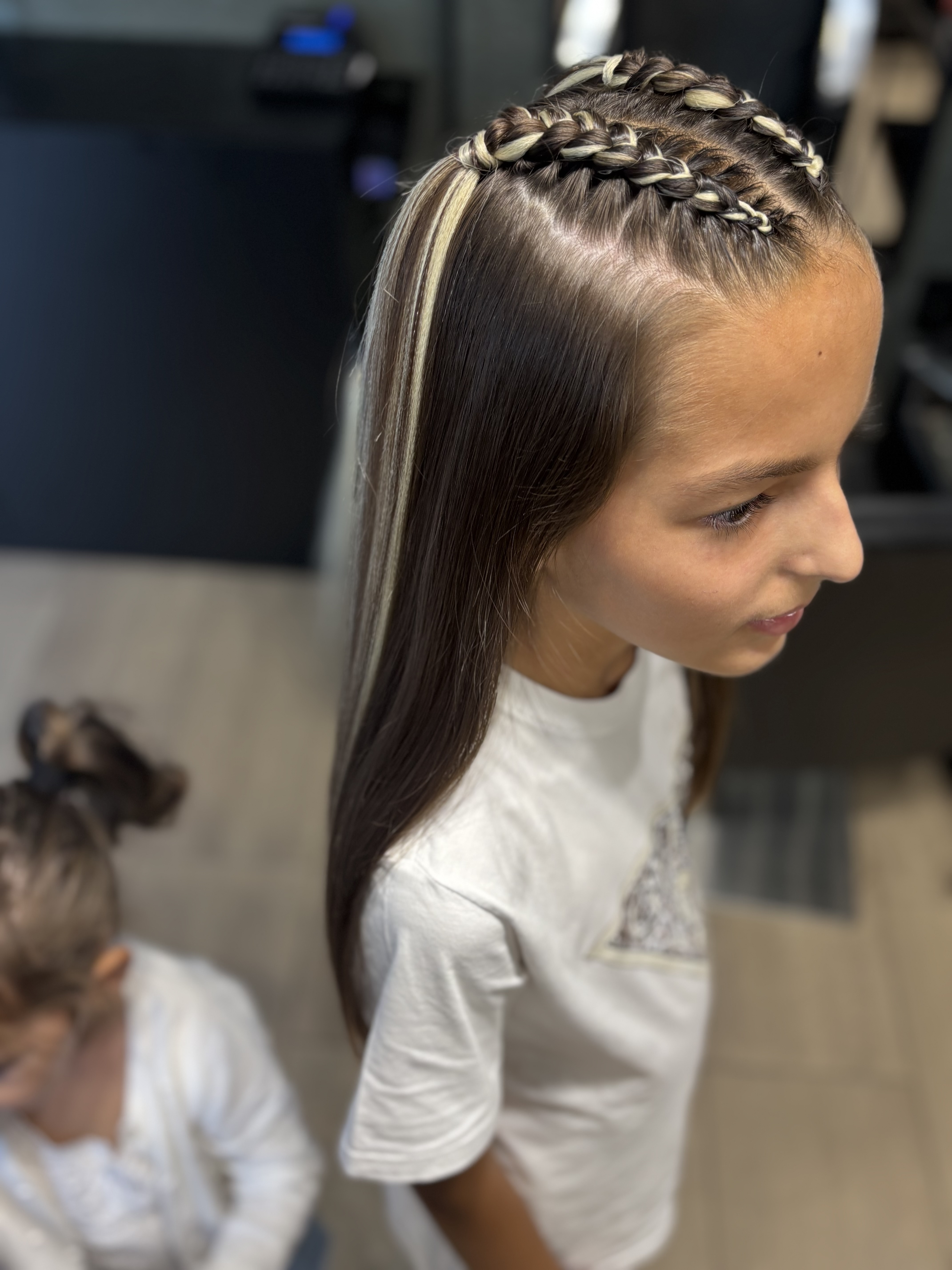 Kids hairstyle with 2 braids