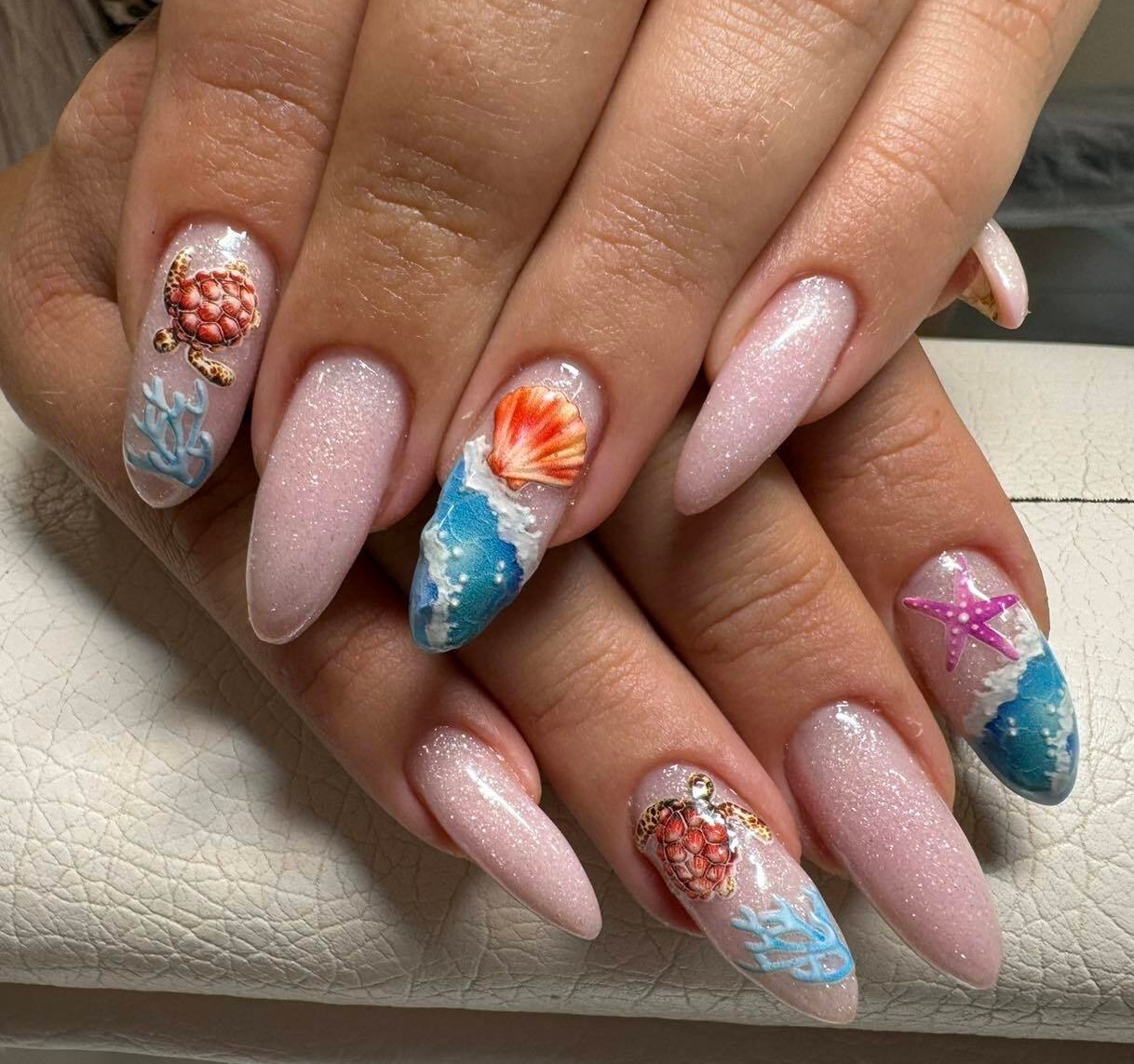 Gel polish manicure with nautical designs